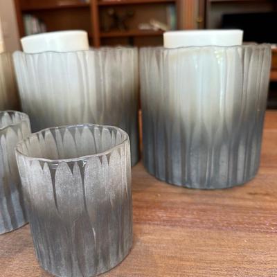 Lot of Restoration Hardware glass candle holders (votives) and extra candles