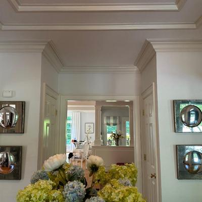 Four antiqued glass wall mirrors/decor