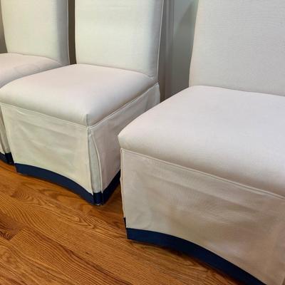 Six fabulous custom upholstered navy and white slipper chairs (table sold separately)