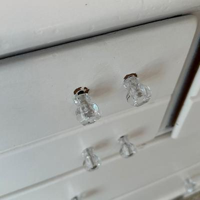 White antique dresser with crystal handles