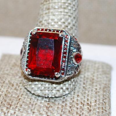 Size 12¼ Large Red Emerald Cut Stone Ring with Red Side Stone Accents on a Solid Silver Tone Band (10.7g)