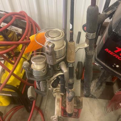 A9-Johnson 4 motor, Marvel Mystery Oil and 3 fishing rods