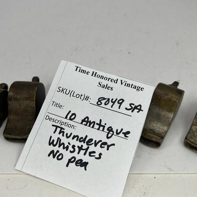10 Antique metal whistles