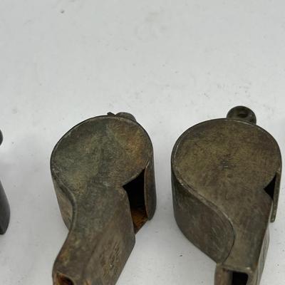 10 Antique metal whistles