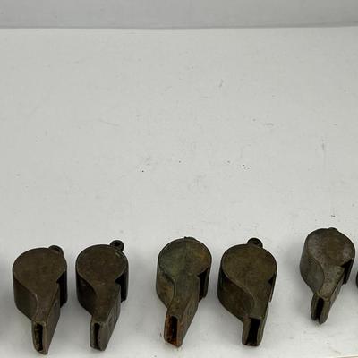 10 Antique metal whistles