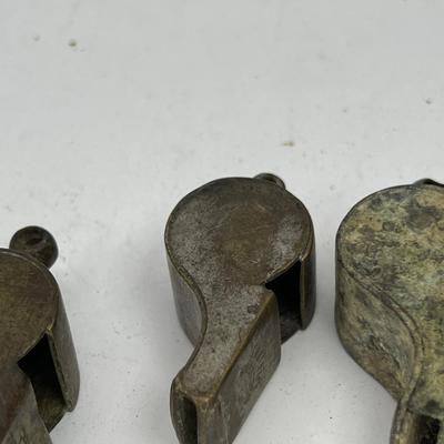 10 Antique metal whistles
