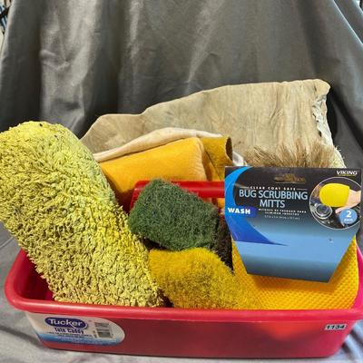 Tub of car wash supplies