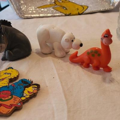 Cartoon memorabilia watch including Batman glasses and Bugs Bunny items