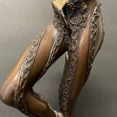 Pair of Gilbert Kruft Bronze Figural Candlesticks