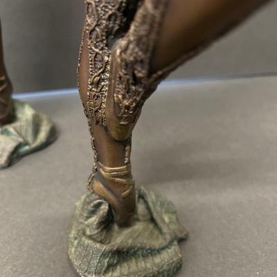 Pair of Gilbert Kruft Bronze Figural Candlesticks
