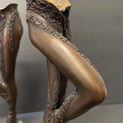 Pair of Gilbert Kruft Bronze Figural Candlesticks