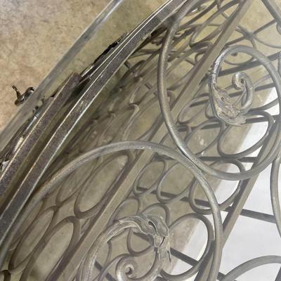 Glass Top Demilune Console With Scrolling Metal Base and Wine Rack