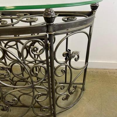 Glass Top Demilune Console With Scrolling Metal Base and Wine Rack