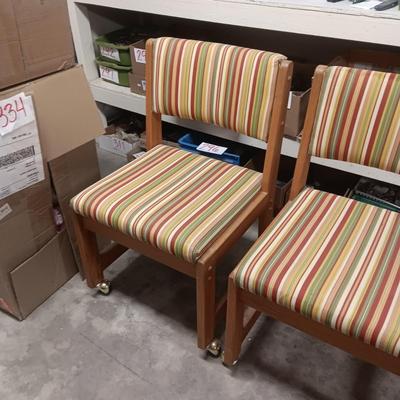 2 UPHOLSTERED CHAIRS ON CASTERS