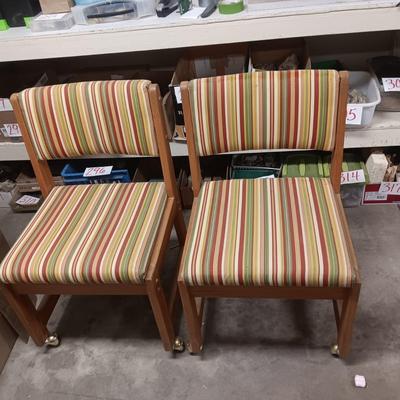 2 UPHOLSTERED CHAIRS ON CASTERS