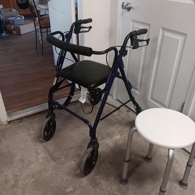 TALL 4 WHEEL WALKER W/HAND BRAKES AND A SHOWER SEAT