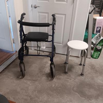 TALL 4 WHEEL WALKER W/HAND BRAKES AND A SHOWER SEAT