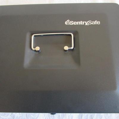 Sentry Safe Cash Box. new with keys