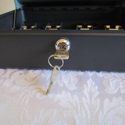 Sentry Safe Cash Box. new with keys