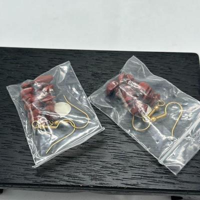 Two pair of earrings