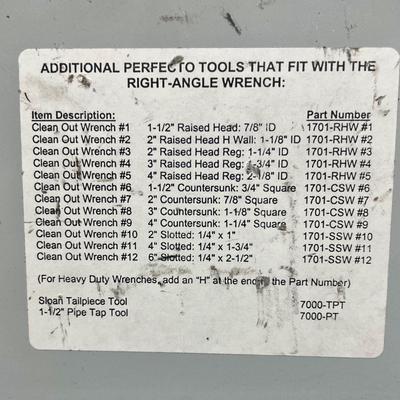 Plumbers Clean Out Wrench and Fittings