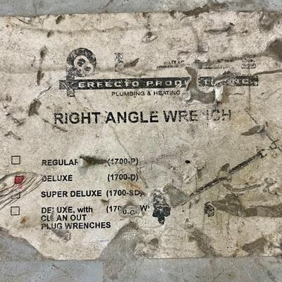 Plumbers Clean Out Wrench and Fittings