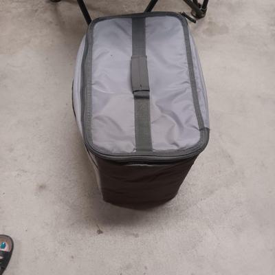 FOLDING CANVAS CHAIR AND AN ARTIC COOLER