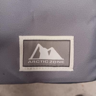 FOLDING CANVAS CHAIR AND AN ARTIC COOLER