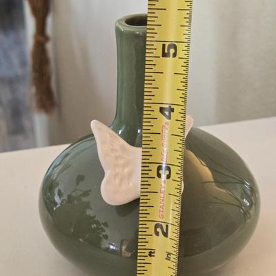 Green Ceramic Vase with A White Butterfly