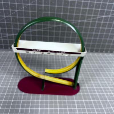 Vintage Snap a Loop Marble Game Metal 