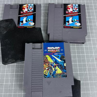 (3) NES NINTENDO GAMES; Duck Hunt (2) and a Bionic Commando