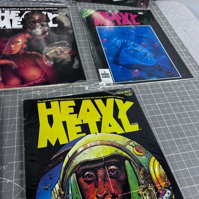 (8) Issues of HEAVY METAL Magazines 80's to early 90's WOW!