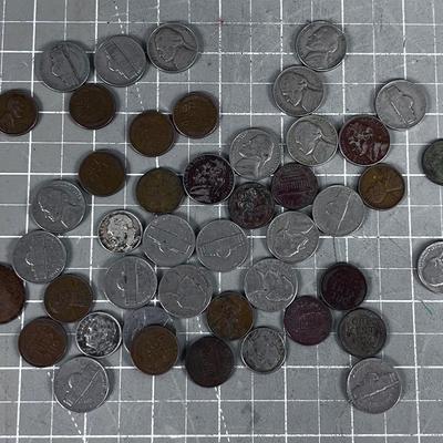 Unsearched Pile of Coins; Silver Dime, Wheat Pennies and old Nickels From Piggy Bank