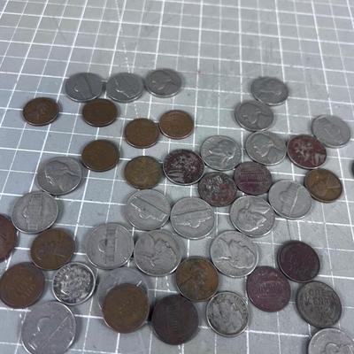 Unsearched Pile of Coins; Silver Dime, Wheat Pennies and old Nickels From Piggy Bank