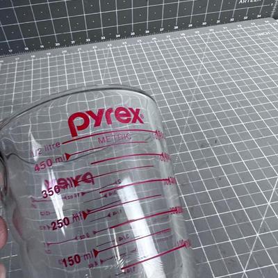 2 Pyrex Measuring Cups 