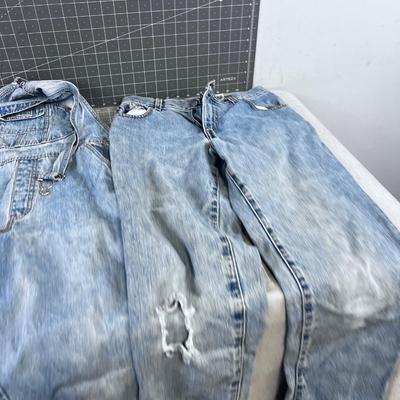 Levi's 550 Size Large Coveralls And Size 6 Miss Levi's Jeans