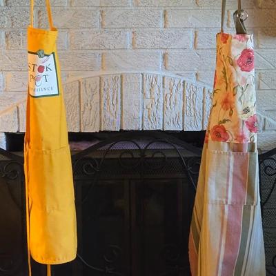 (2) Aprons