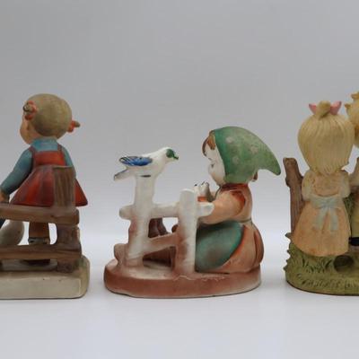 Vintage Figurines of Children on Fences
