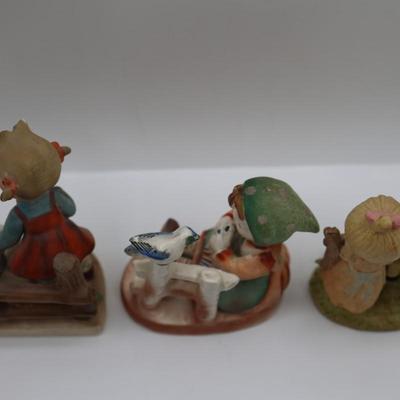 Vintage Figurines of Children on Fences