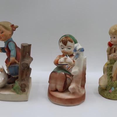 Vintage Figurines of Children on Fences
