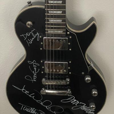 The Eagles band signed guitar 