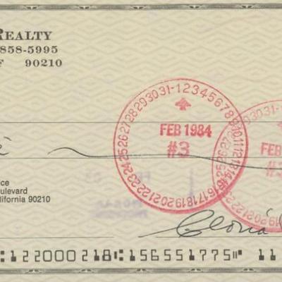 Gloria Pall signed check 