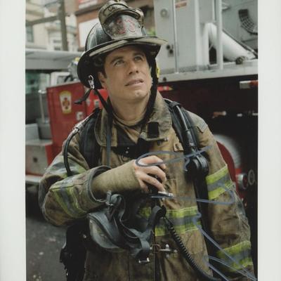 John Travolta signed movie photo. GFA Authenticated