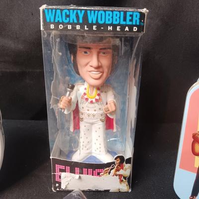 2 TIN ELVIS BOXES, WACKY WOBBLER & 3 CLOTH MASKS