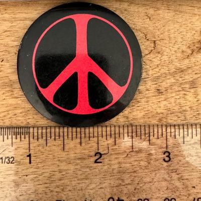 Peace sign button