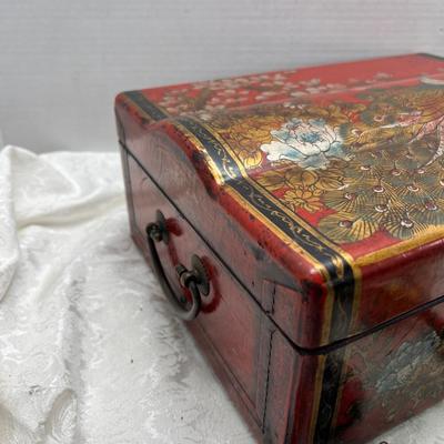 Red Asian display box with inner papered rack