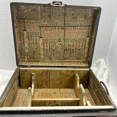 Red Asian display box with inner papered rack