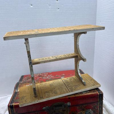 Red Asian display box with inner papered rack