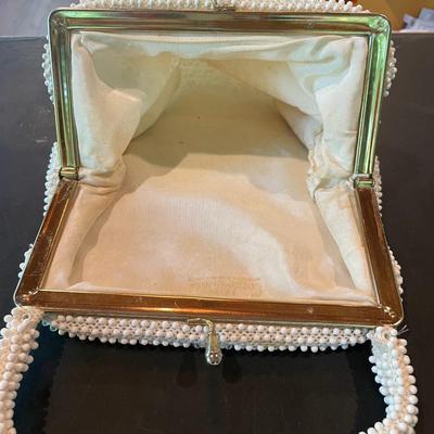 White beaded, hinged opening evening bag