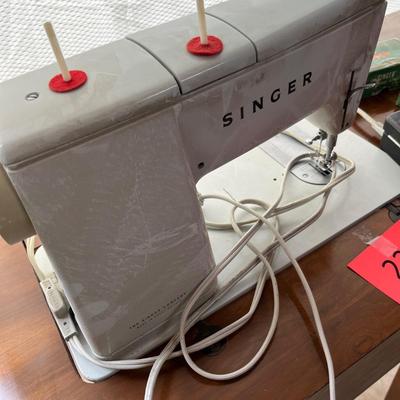 Singer Sewing machine in cabinet